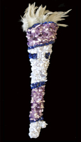 Rhadalognatus: 
						(Skull) resin replica of a Rhadalognatus boweni; an amphibian of the Triassic period. (Feathers) Mallard. The piece is covered with tumbled and polished Amethyst, Blue Lace Agate and Lapis Lazuli 
						stones (Size) Approximately 17 x 4 inches.